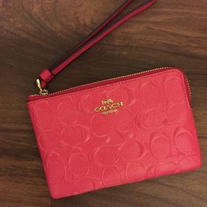 Coach small wristlet.